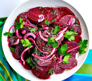 beet salad in a white bowl
