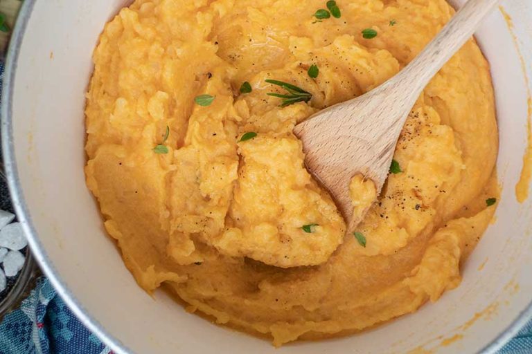yam and sweet potato mash in a pot served as a side dish