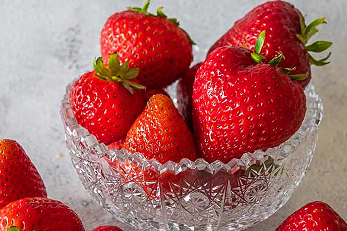 fresh strawberries in a crystal bowl