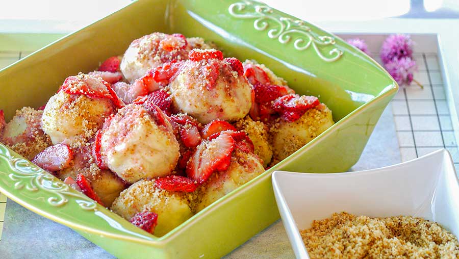 strawberry dumplings with topping in a dish, gluten-free