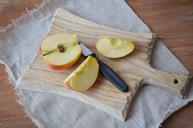 sliced apple on a cutting board