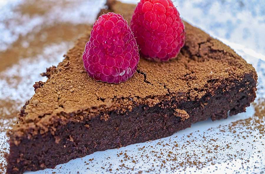 slice of flourless chocolate ganache cake