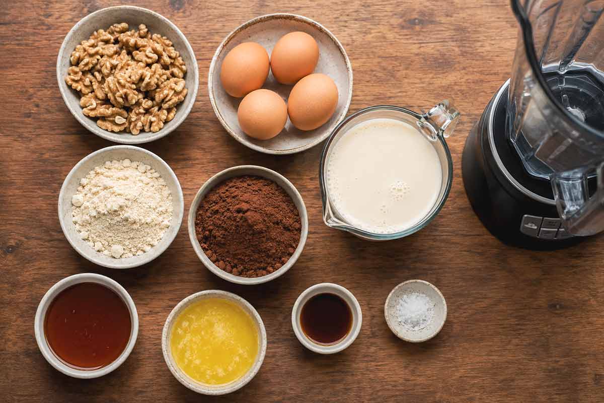 coconut flour, melted butter, eggs, milk, walnuts, cocoa powder, salt, maple syrup & vanilla, ingredients for chocolate walnut pie