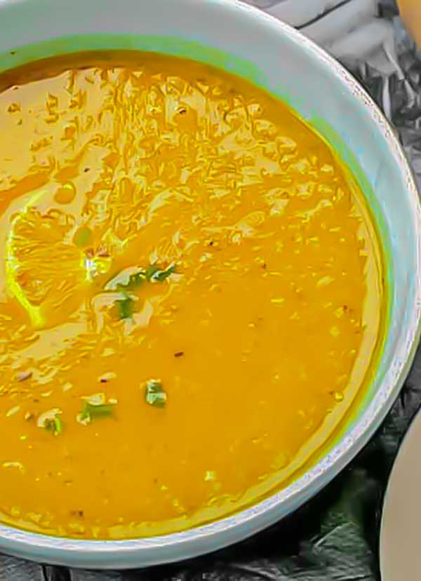 close up butternut squash bisque in a bowl