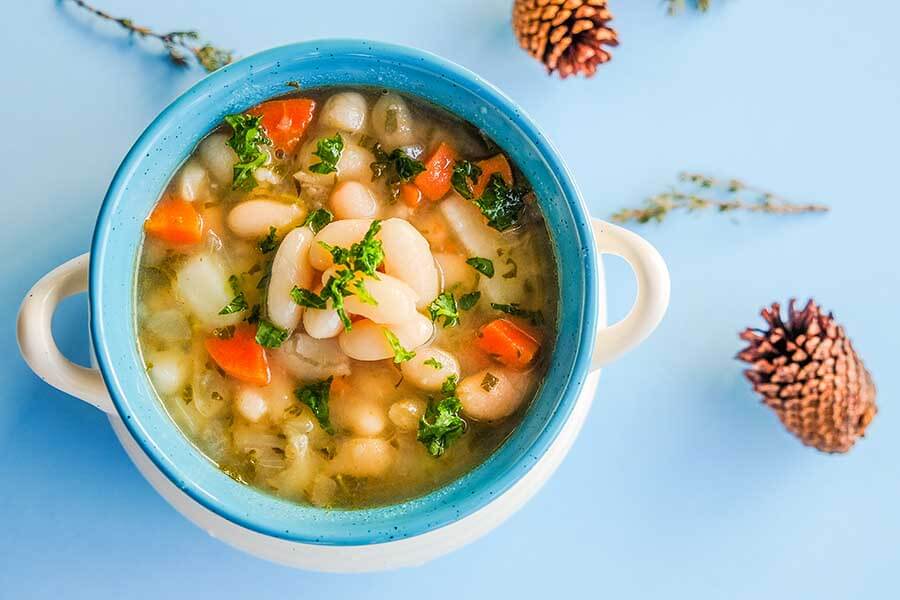 vegan, white bean, fall soup in a mug