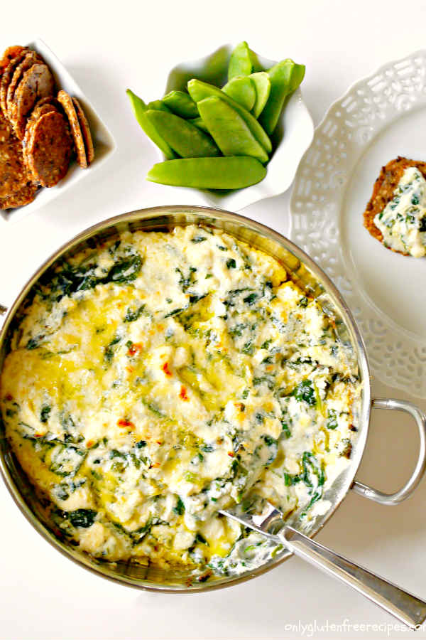 baked spinach ricotta dip in a bowl