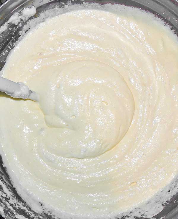 mascarpone cheese in a bowl with a spoon