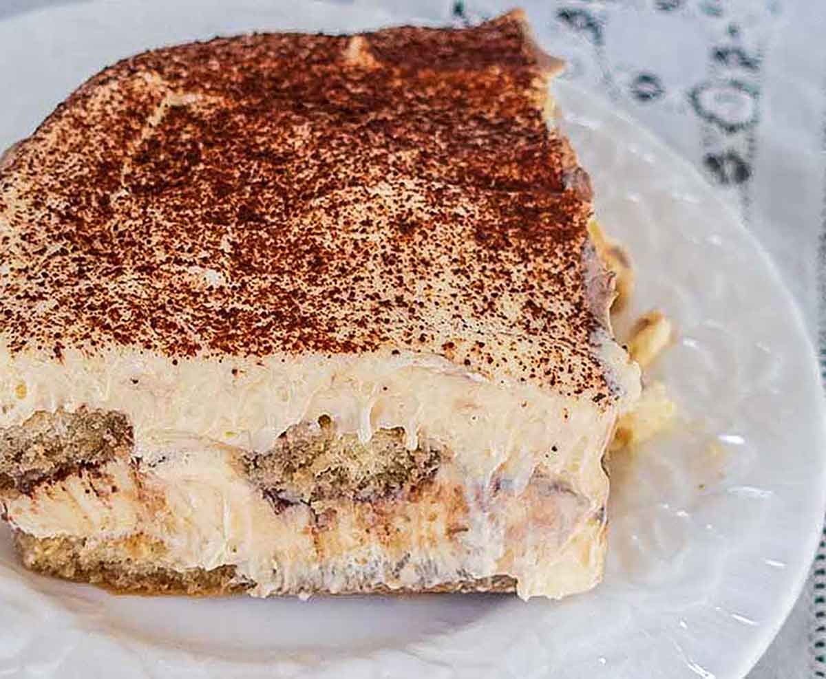 close up of a slice of gluten free tiramisu on a dessert plate