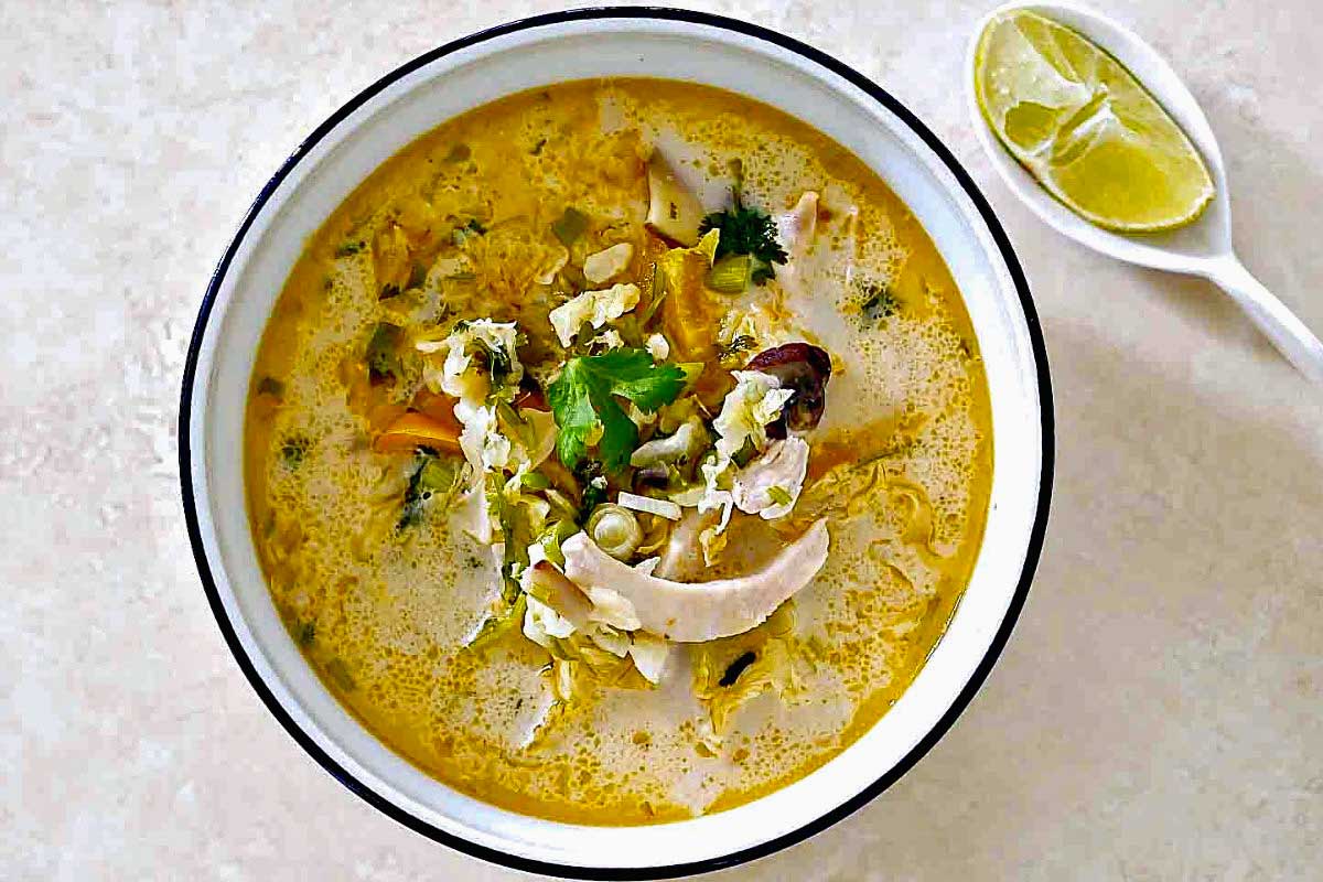 close up of a bowl of Thai Coconut Chicken Soup with Vegetables