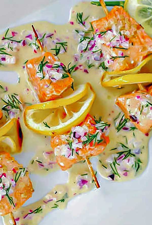 salmon with lemon slices on skewers