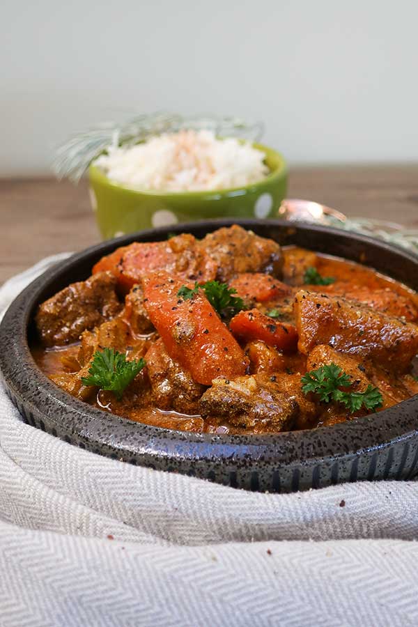 african beef stew with a side of rice
