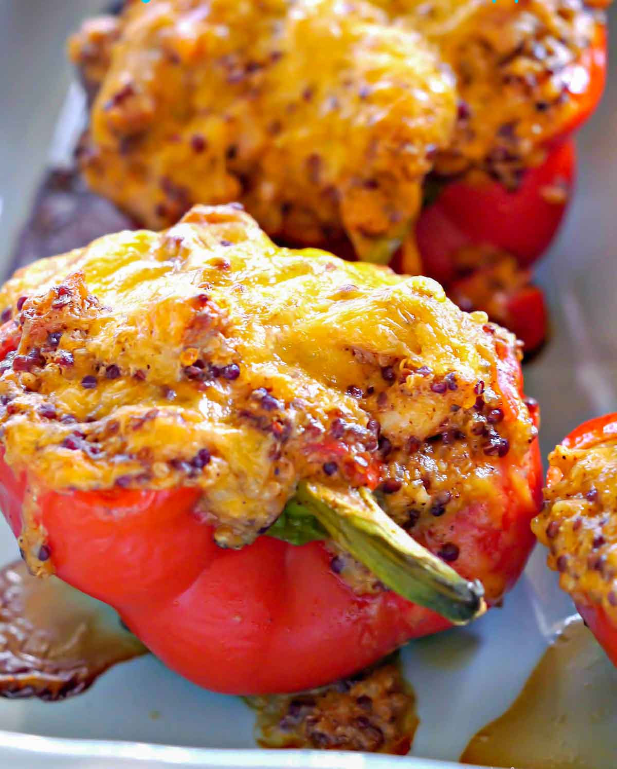 one cheesy chicken stuffed pepper on a plate