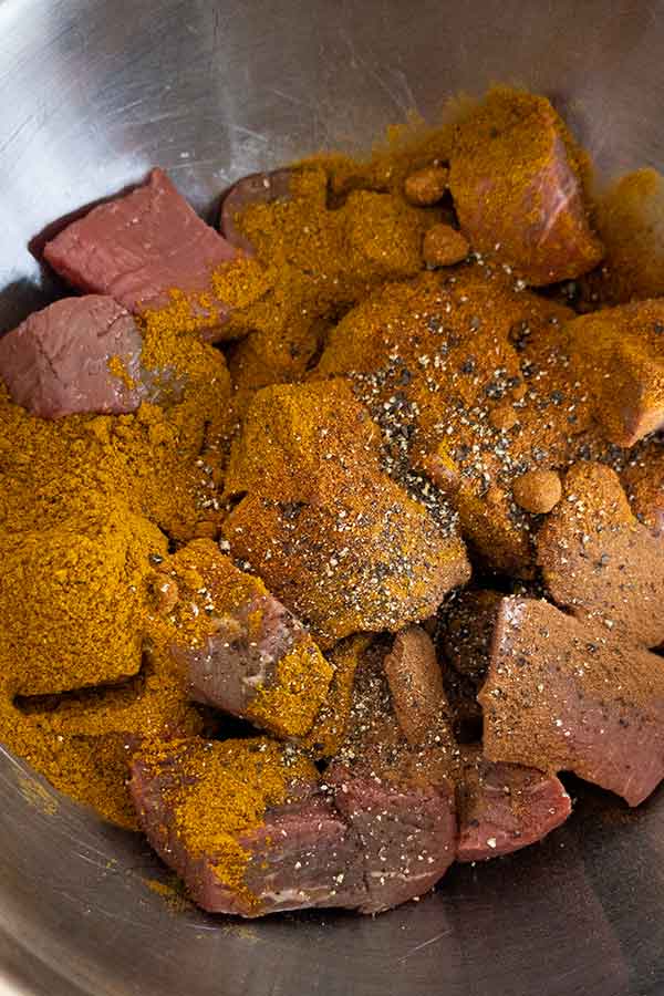 raw seasoned beef in a bowl