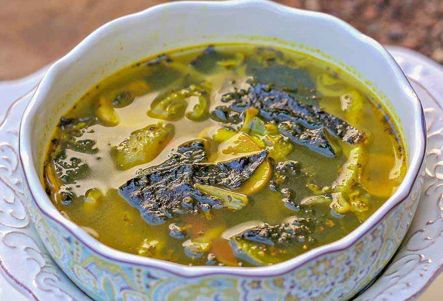 immune boosting soup in a bowl topped with nori