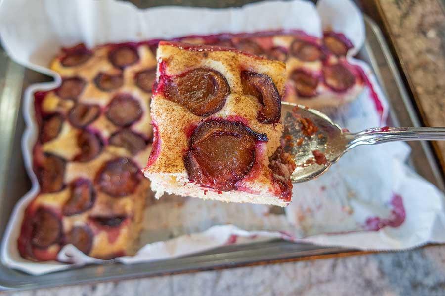 gluten free summer plum dessert in a pan