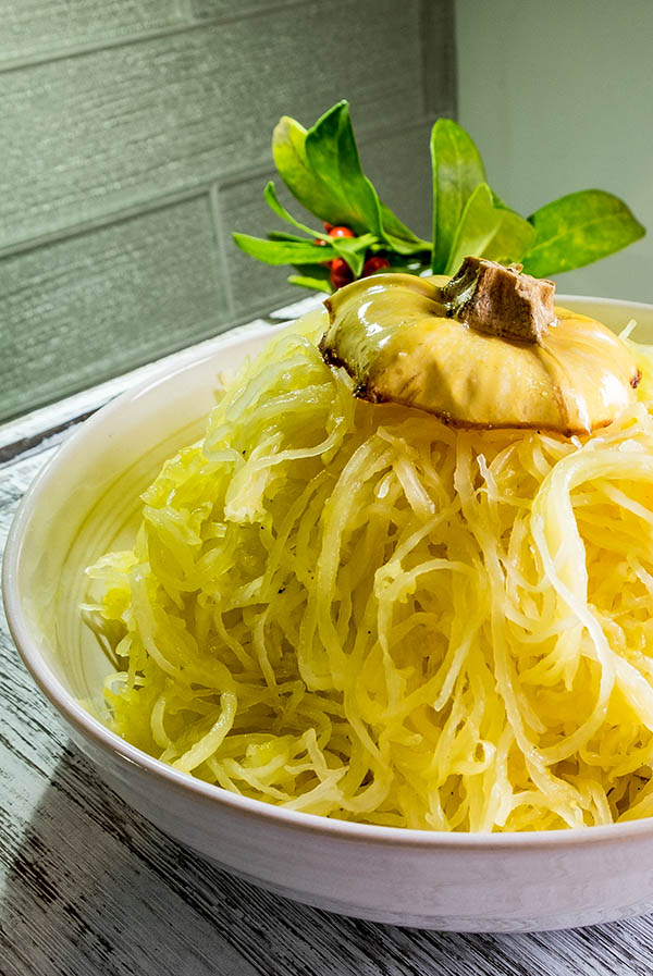 cooked spaghetti squash strands in a bowl