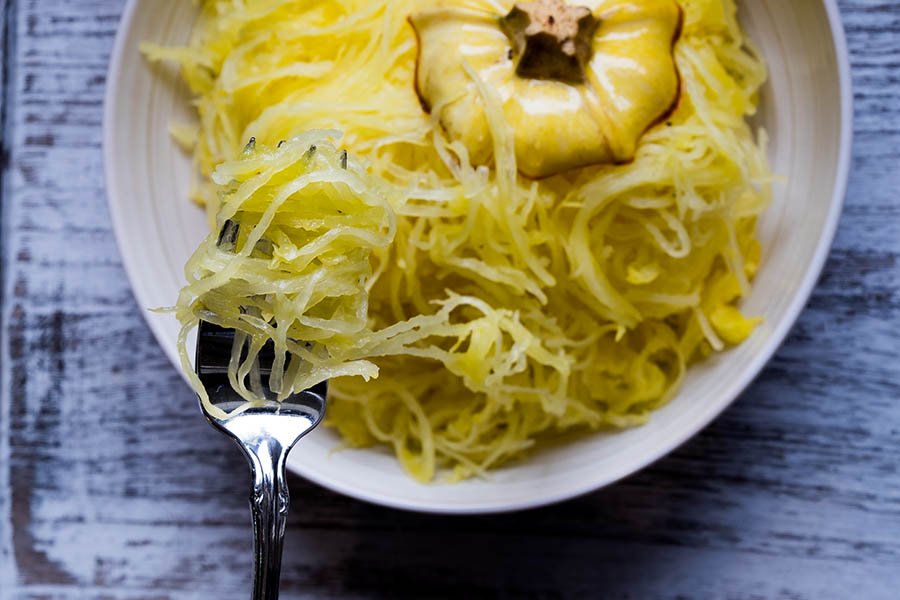 squash strands on a plate, how to cook spaghetti squash