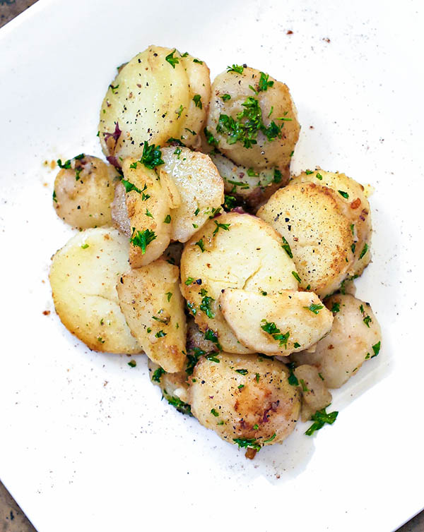 German potatoes with parsley on a plate