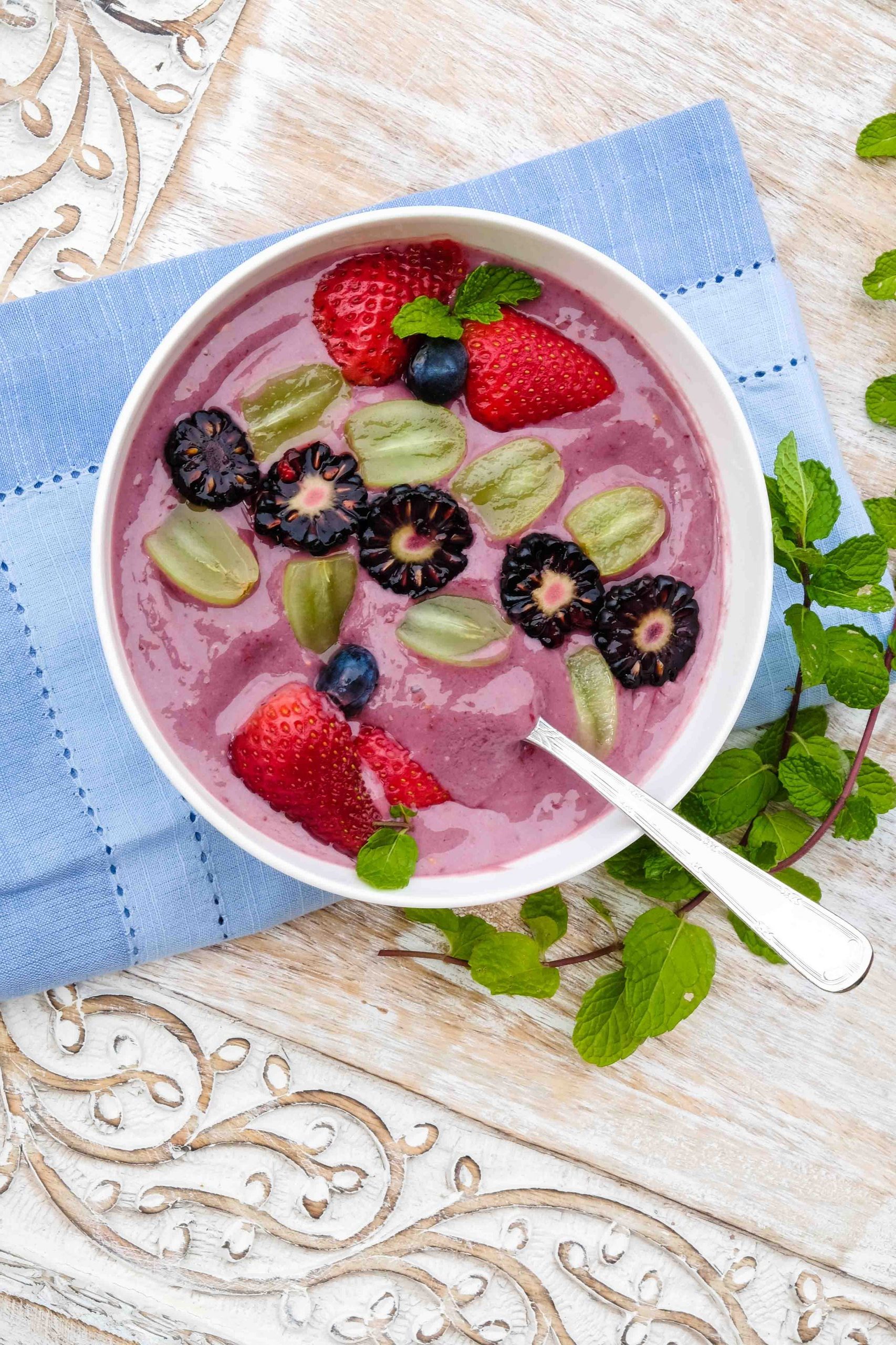 overview of smoothie bowl topped with berries