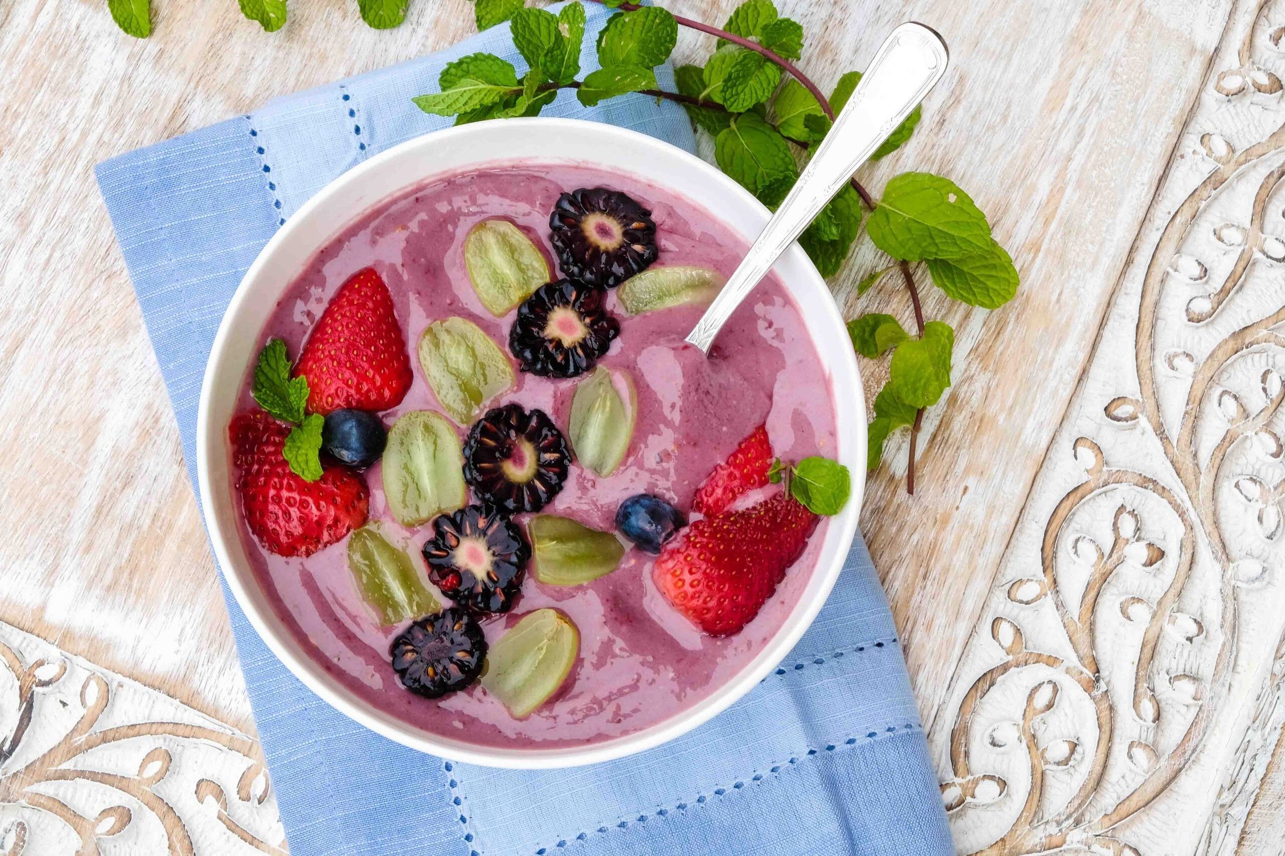 overview of smoothie bowl topped with berries