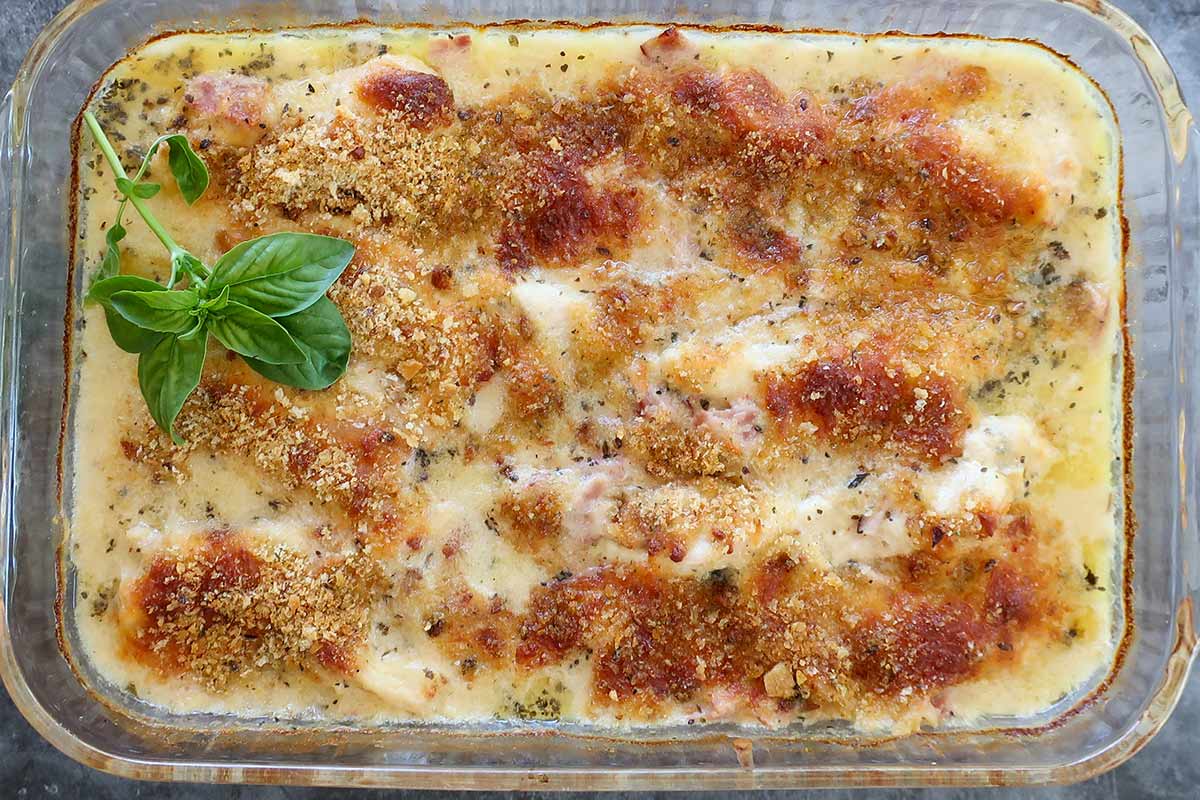 freshly baked gluten-free chicken cordon bleu in a casserole dish with crispy breadcrumb topping