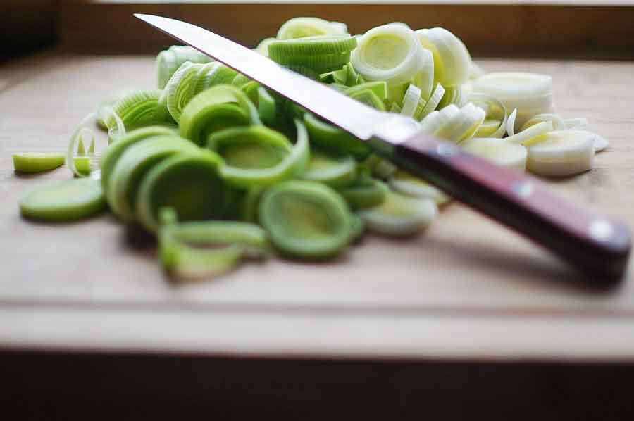 sliced leeks on a cutting board