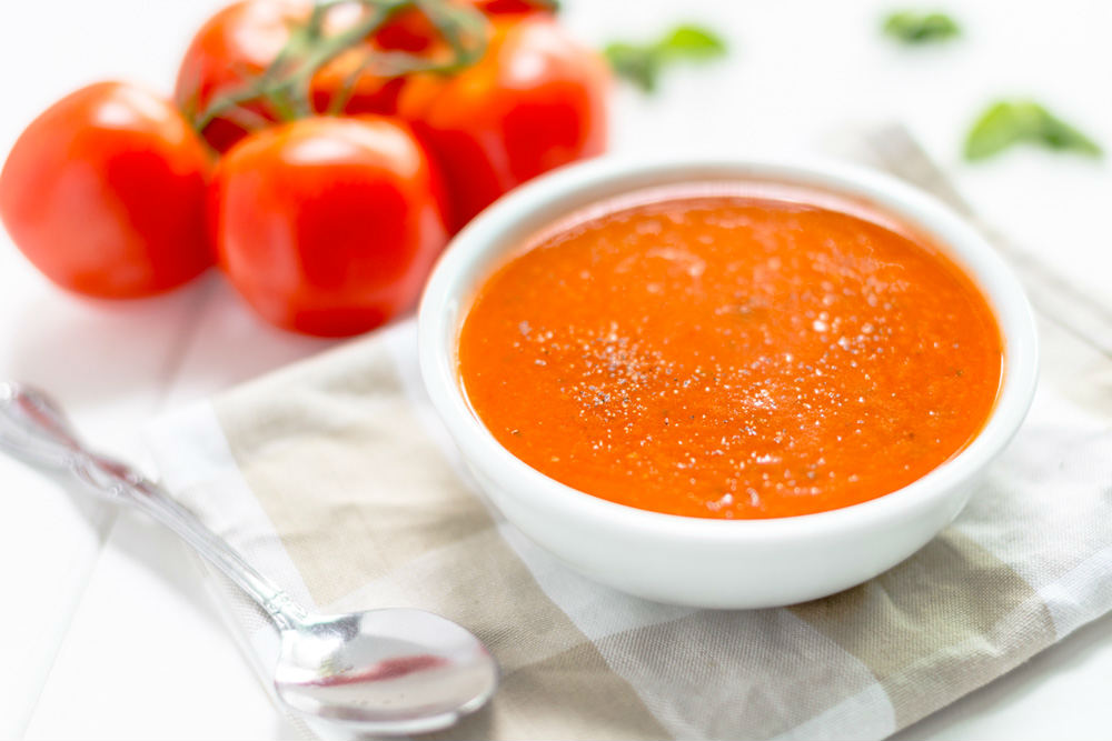 a bowl of fresh tomato soup