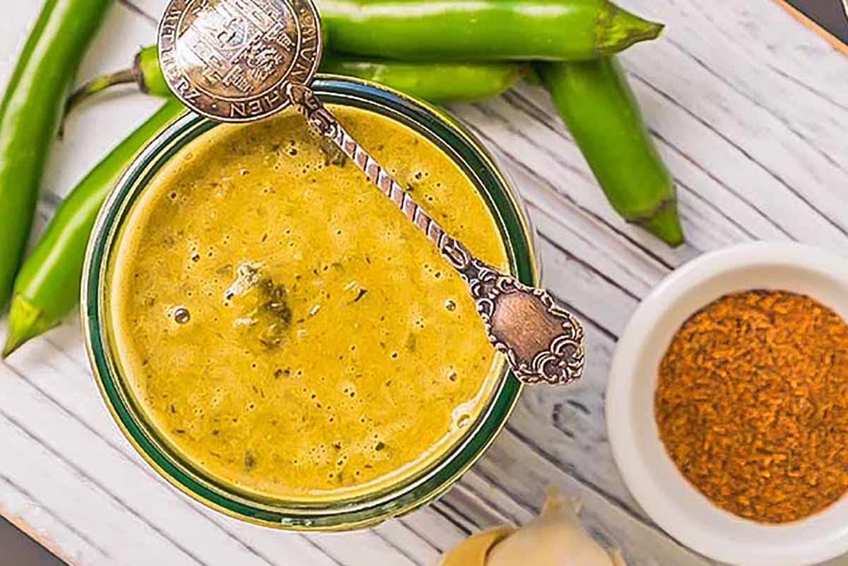 green enchilada sauce in a glass jar