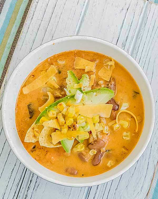 Santa Fe chicken soup in a bowl with toppings