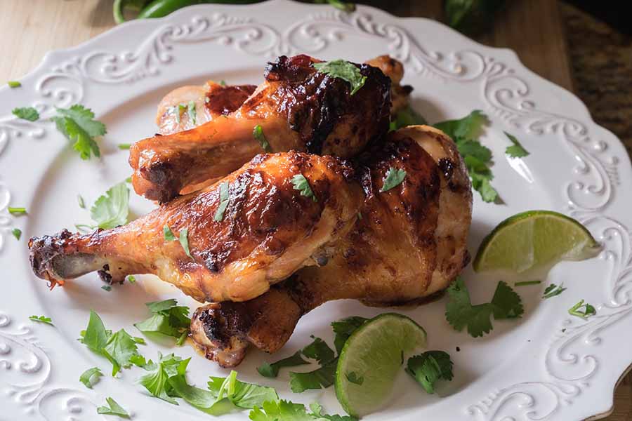  tequila chicken drumsticks on a plate