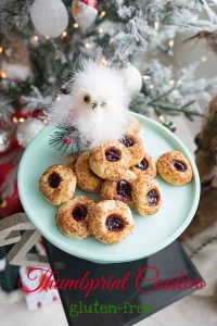 thumbprint Holiday cookies on a plate, gluten free
