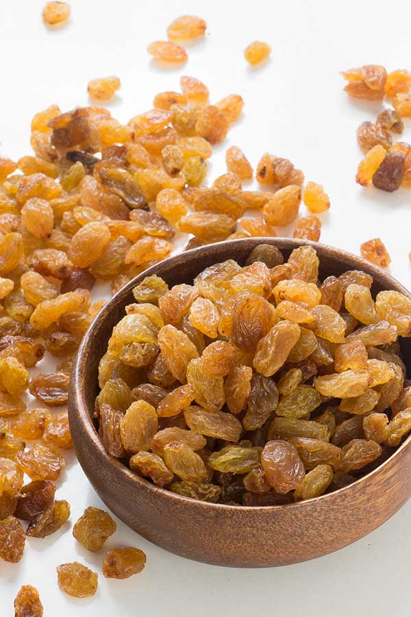 raisins in a wooden bowl