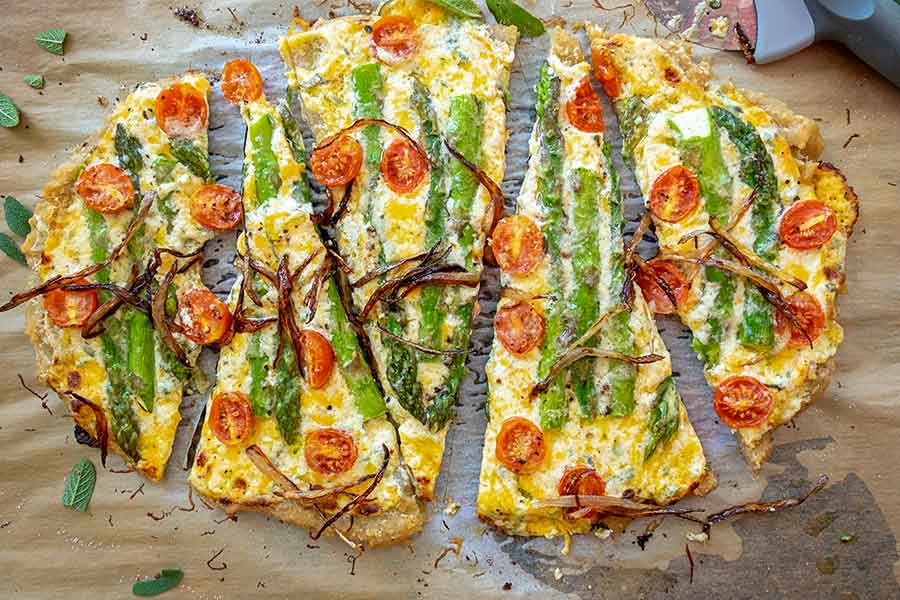 sliced gluten-free flatbread appetizer on a wooden board