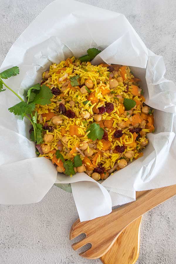 moroccan chickpea rice salad in a large salad bowl