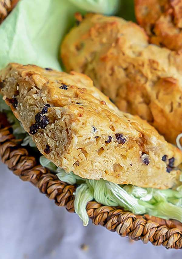 close up of baked scone in a basket