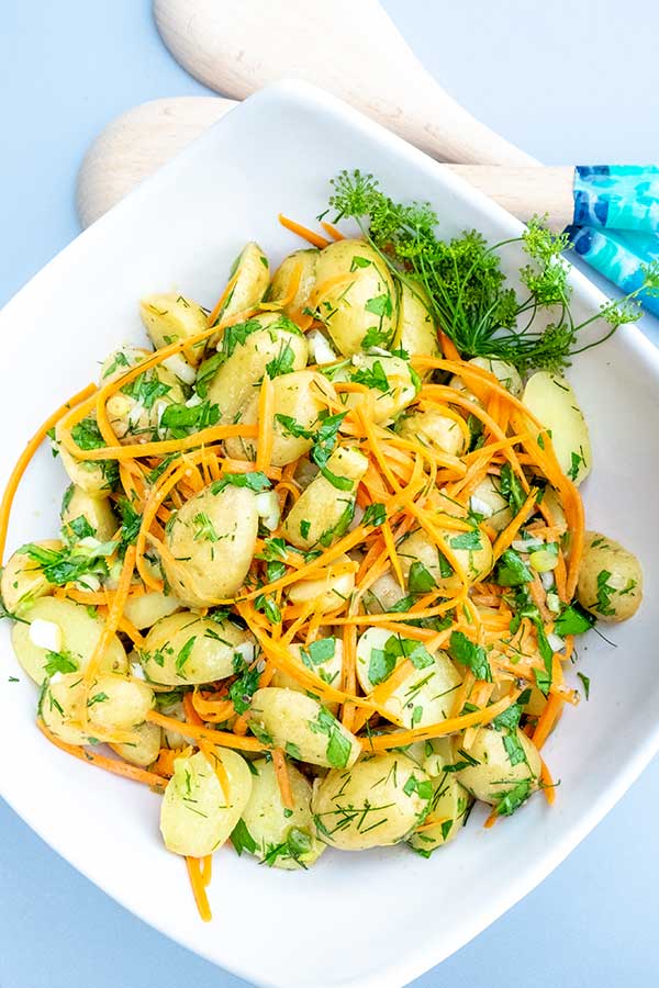 potato salad with carrots in a bowl, vegan recipe