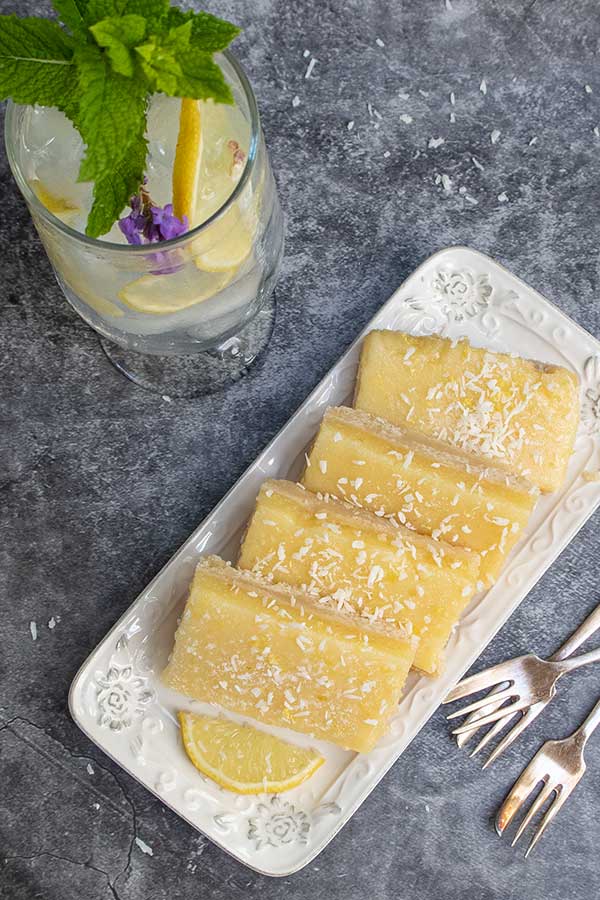 top view of sliced lemon bars on a plate