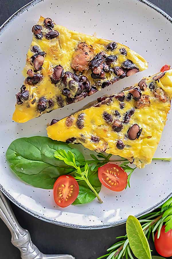 top view of two slices of one pan breakfast eggs and veggies