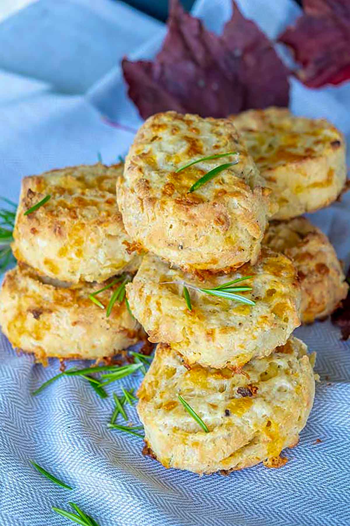 3 freshly baked gluten free rosemary cheesy biscuits 