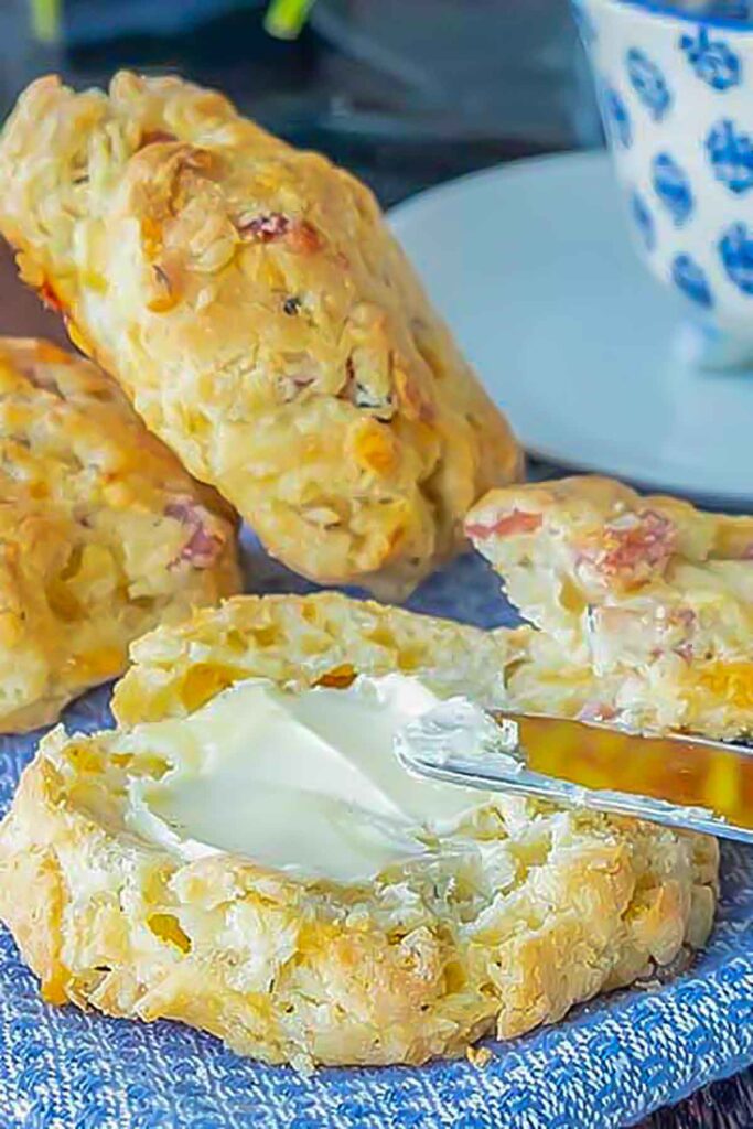 gluten free ham and cheese biscuits smeared with butter