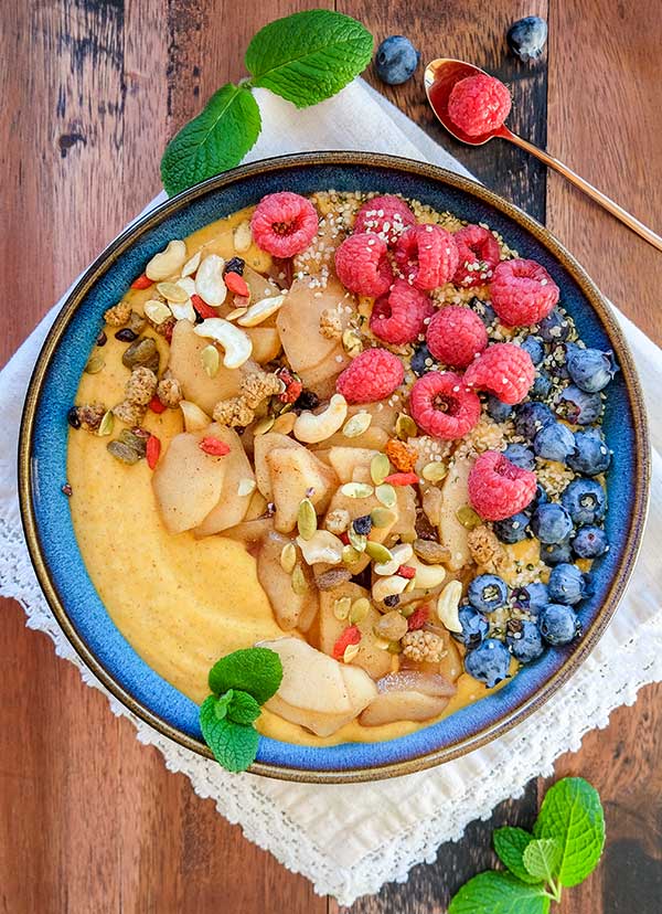 pumpkin yogurt bowl topped with berries