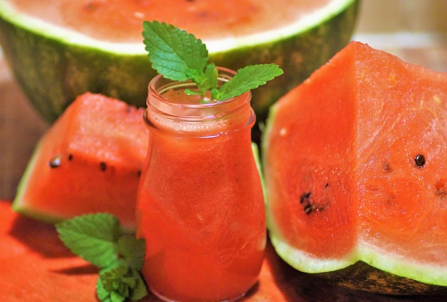 fresh watermelon and watermelon juice in a glass