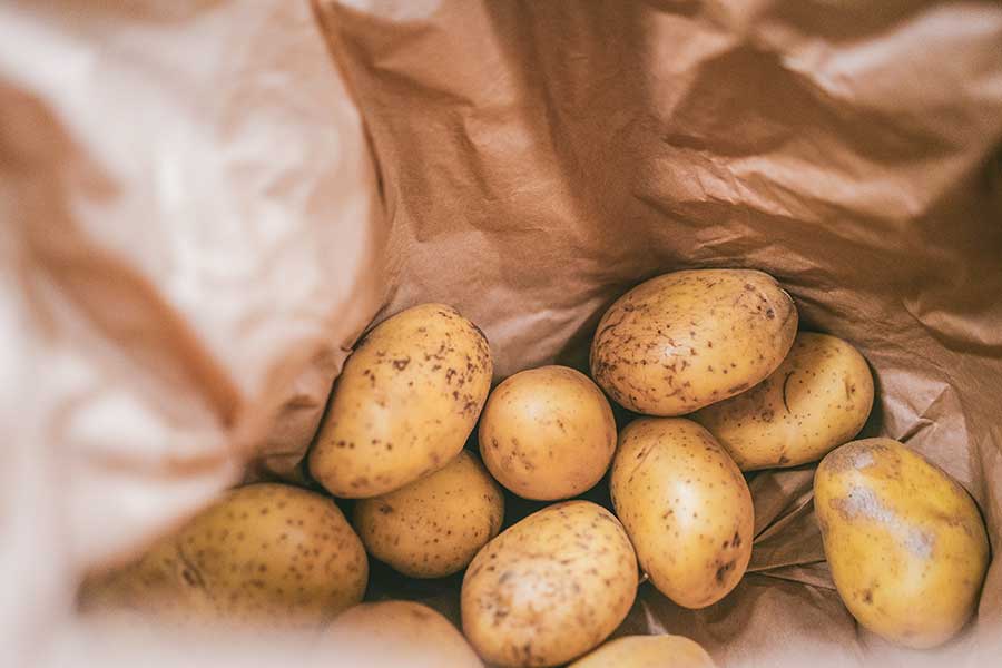 yellow raw potatoes