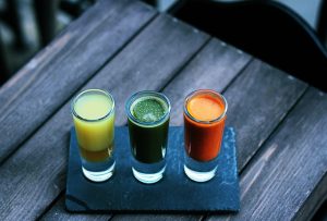 3 glasses of different juices on the table