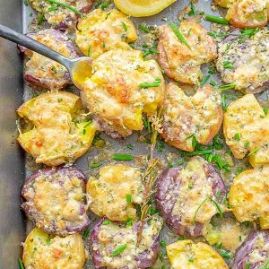 Smashed Crispy Potatoes with Garlic Herb Lemon Butter & Parmesan Cheese