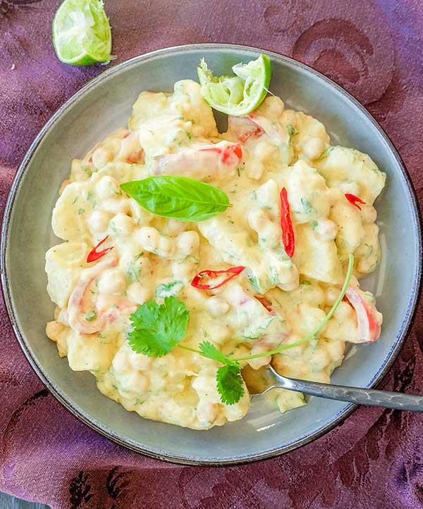 curried potato salad in a bowl