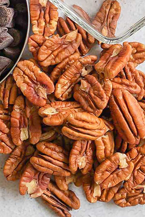 scattered pecans on a table