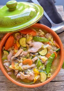 chicken stew with veggies in a serving bowl