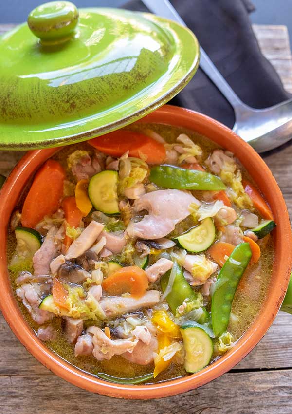 chicken stew with veggies in a serving bowl.