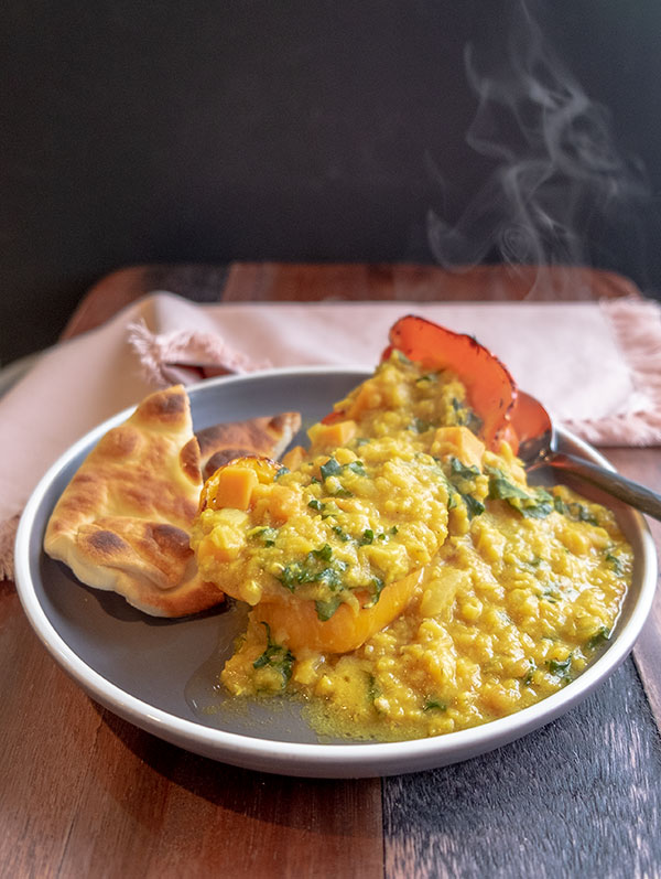 lentil curry with Indian bread on a plate